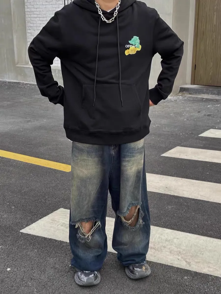♻️💯Reference model picture for the upper body❤️[New arrival] 23SS top tested version environmental protection series OFF WHITE OW environmentally friendly ink hand-painted color graffiti pure cotton loose unisex hoodie hooded sweatshirt This printing only took two months to make the board, the effect is explosive, can directly distinguish the market currency. I won’t introduce much else about this and go directly to the key points. The graffiti part of this printed tree adopts the screen scraping paint graffiti process. The craftsmanship is very realistic, and the foaming treatment on the printing surface is very good, just like the texture of the brush, it is very clear and the texture is smooth. Many versions on the market directly look at the pictures to make the pattern, without worrying about this detail. The color of the front chest is the new slogan of the small size, and the back is also different. The overall printing on our back has the same effect and the same foaming process, which feels very good to the touch and looks very layered! They are all framed by the classic and iconic large warning arrows. The black ones are lake green arrows, with a few white watery patterns added; the white ones are sky blue arrows.  The fabric is made of 460g double-ply double-yarn terry fabric. The fabric feels smooth and has full drape. Size: XS-L P:390